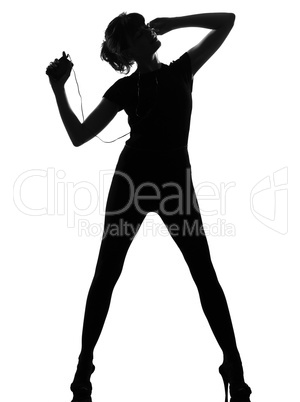 silhouette woman dancing and listening music