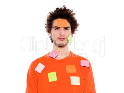 one young man portrait covered by  adhesive notes