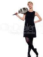 woman holding frying pan