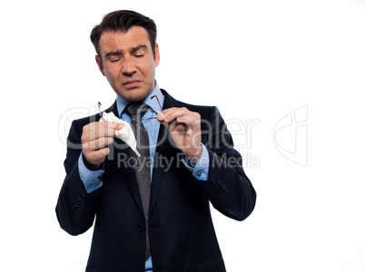 Man cleaning eye glasses