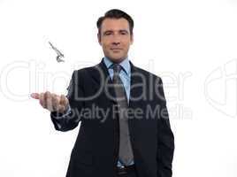 Man Businessman realtor teasing holding offering keys