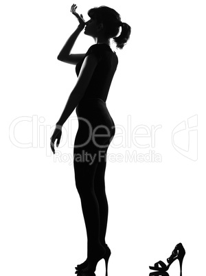 silhouette woman smelling perfume