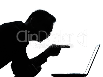 one business man silhouette computing computer laptop pointing