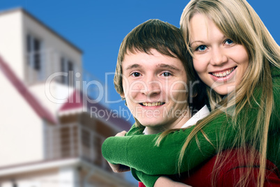 happy young couple and home