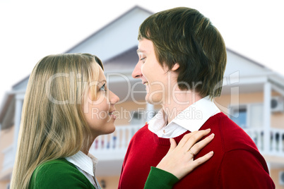 happy young couple and home