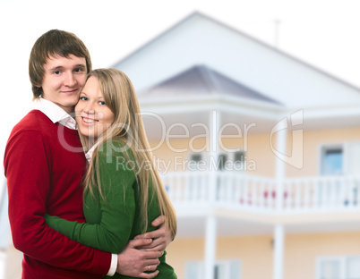 happy young couple and home