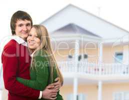 happy young couple and home