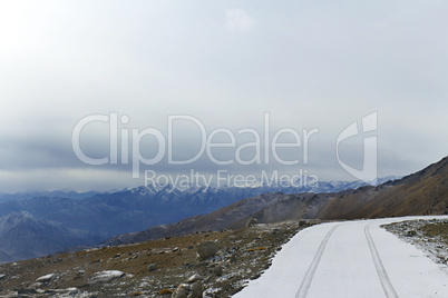 Snow-covered road on a mountain pass