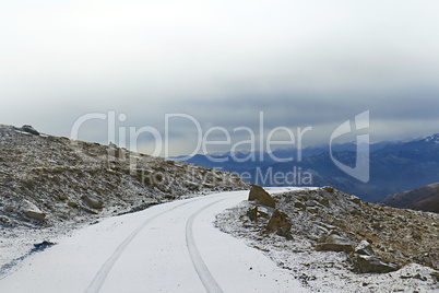 Snow-covered road on a mountain pass