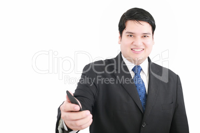 Handsome young man in a suit giving you a mobile