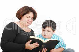 mom and son reading the Bible.