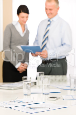 Office supply - two business people discussing