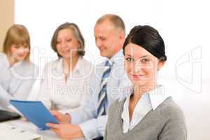 Young executive woman look camera during meeting