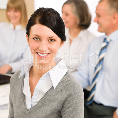 Young executive woman look camera during meeting