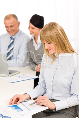 Businesswoman at team meeting study report