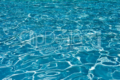 beautiful clear pool water reflecting in the sun