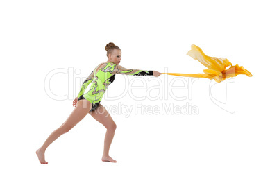 Young beauty gymnast fight with flying fabric