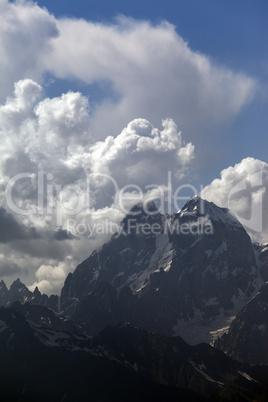Mt. Ushba in clouds, Caucasus Mountains, Georgia, Svaneti.