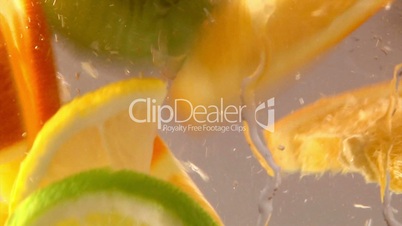 Fruits in water, citrus, closeup