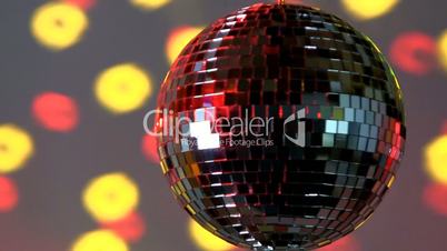 Full mirror ball; yellow and red light