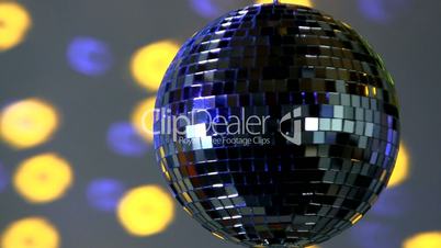 Full mirror ball; yellow and blue light