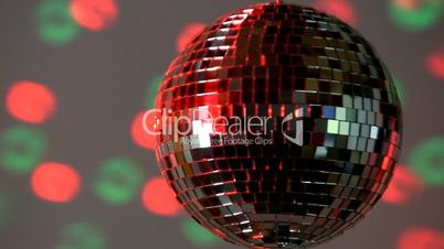 Full mirror ball; green and red light