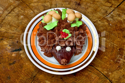 Cake in the form of a hedgehog on a wooden stand