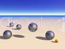 Petanque game balls on the sand
