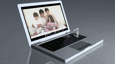 Laptop und Familie