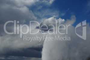 Old Faithful Geysir and Clouds, Yellowstone National Park, Wyoming