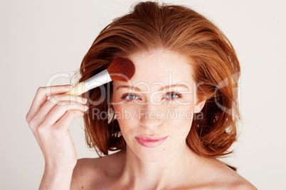 Woman Applying Face Powder