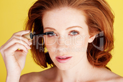 Pretty Woman Applying Mascara