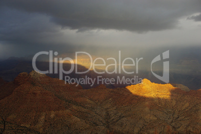 Dark clouds and sun on Grand Canyon, Arizona