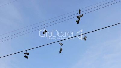 Running Shoes Hanging From Telephone Wires