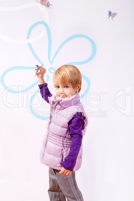 Small girl in pink vest with toy airplane