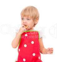 Little girl eating bagel