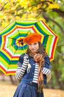 Young pretty girl with umbrella