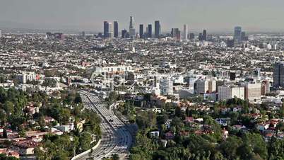 Los Angeles city view with traffic on freeway