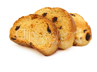 A tasty biscuit with raisins on a white background.