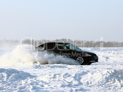 Car on winter road.