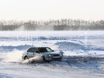 Car on winter road.