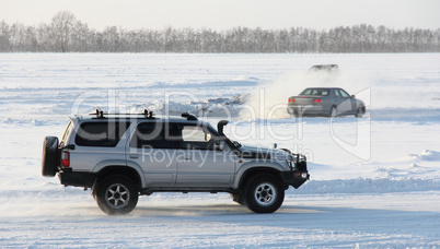 Car on winter road.