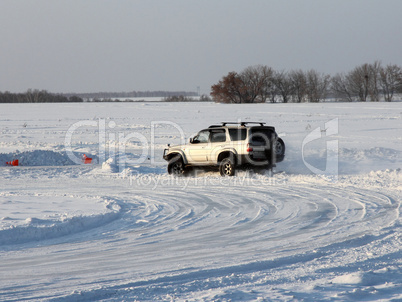 Car on winter road.