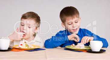 two boy wich cake