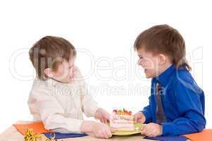 two boys with cake