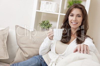 Woman Drinking Tea or Coffee at Home