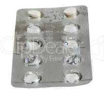Foil packet for tablets with two white tablets