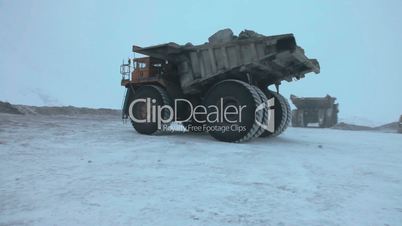 Heavy mining dump trucks
