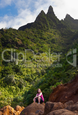 Girl hiking Kalalau trail in Kauai