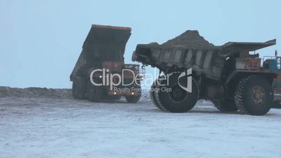 Heavy mining dump trucks